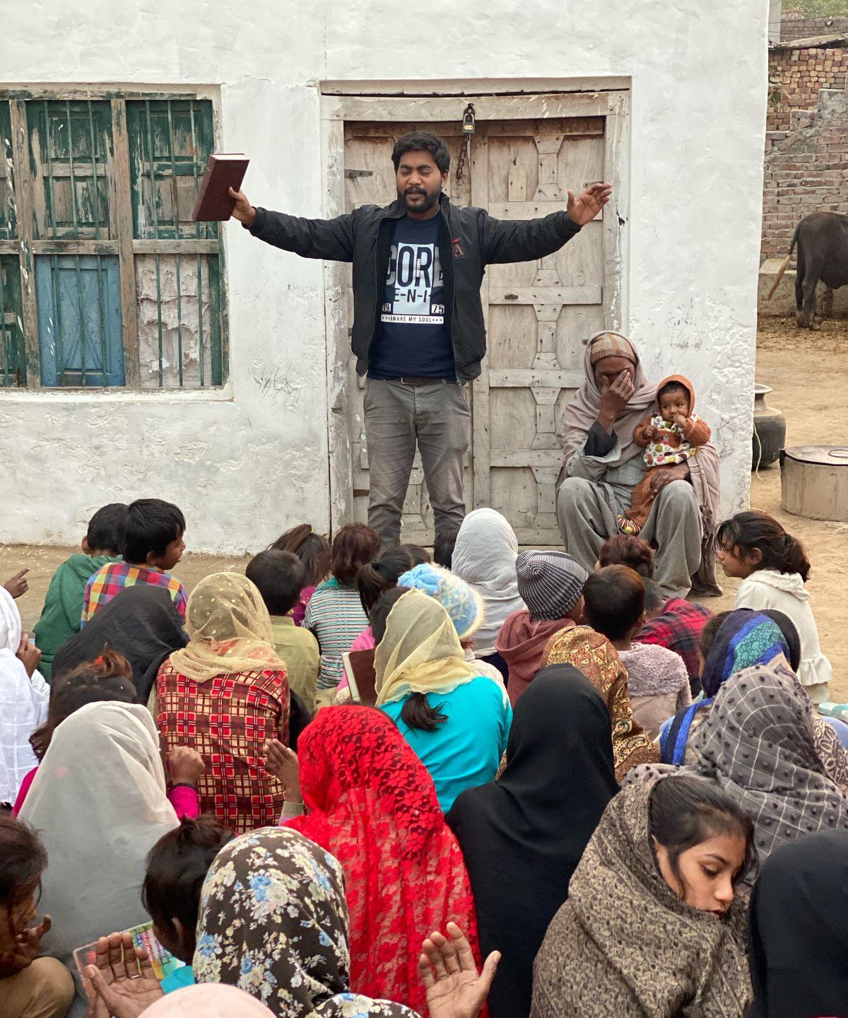 Minister sharing the Word with community in Pakistan